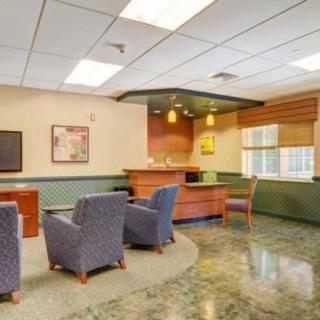 A welcoming lobby with comfortable seating and a reception desk.