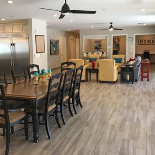 Spacious open floor plan featuring a dining area and comfortable living space.