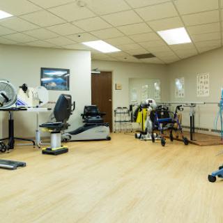 A well-equipped physical therapy room designed for rehabilitation and exercise.