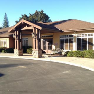 A single-story residential building with a covered entrance.
