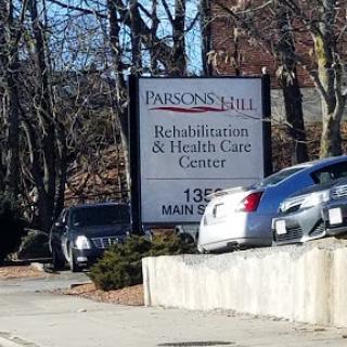 Parson's Hill Rehabilitation & Health Care Center sign outside a facility.