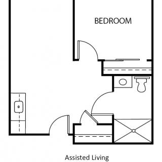 A floor plan of an assisted living apartment featuring a bedroom, bathroom, and kitchen area.