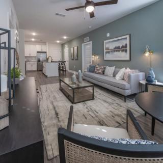 A modern living room with stylish furniture and decor.
