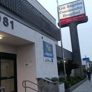 Exterior view of the Los Angeles Community Hospital, showcasing its entrance and signage.