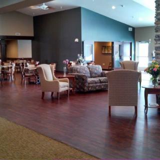 A spacious and elegantly designed lobby area with comfortable seating and warm lighting.