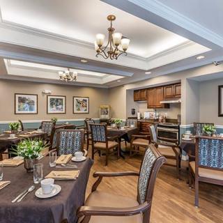 A well-appointed dining room with elegant furnishings and a cozy atmosphere.