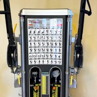 A versatile exercise machine featuring various workout instructions and adjustable settings for strength training.