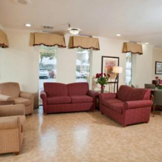A cozy living room with comfortable sofas and tasteful decor.