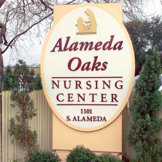 Sign for Alameda Oaks Nursing Center located at 1101 S. Alameda.