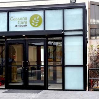 The entrance of Cassandra Care, showcasing modern design and clear signage.