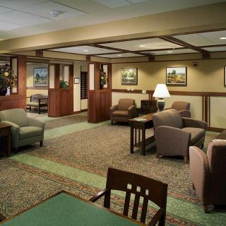 A cozy lobby with comfortable seating and elegant decor.