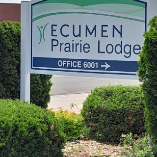 Sign for Ecumen Prairie Lodge, indicating the office location.
