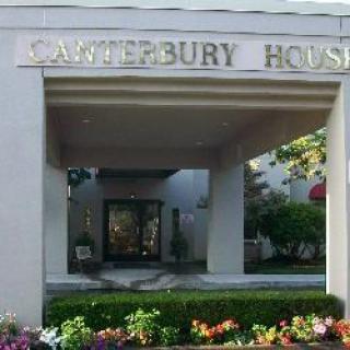 Entrance of Canterbury House with visible signage and surrounding landscaping.