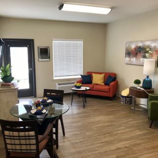 A modern living room with stylish furniture and decor.