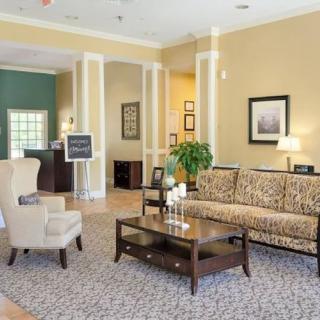 A welcoming living room with comfortable seating and elegant decor.