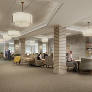 A modern lounge area with comfortable seating and stylish lighting fixtures.