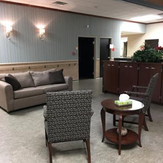 A cozy waiting area with stylish furniture, perfect for relaxation.