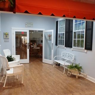 A cozy interior lobby with seating and decorative elements.