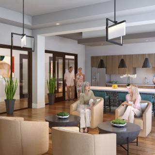 A modern, open-concept living space with a kitchen and seating area.