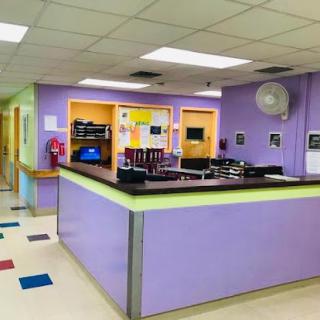 A brightly colored reception area in a pediatric hospital.