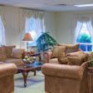 A cozy living room with comfortable sofas and a coffee table.