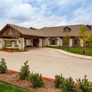 A beautifully designed residential building with a welcoming entrance.
