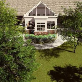 A charming house with a glass conservatory and lush garden surroundings.