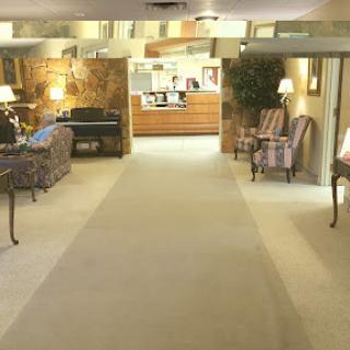 A warm and inviting hotel lobby with comfortable seating and ambient lighting.