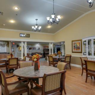 A cozy dining area with elegant decor and comfortable seating.