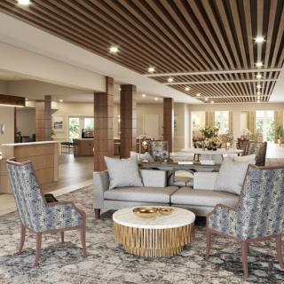 A modern lobby with comfortable seating and elegant decor.