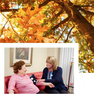 A nurse performing a medical checkup on a patient, with autumn leaves in the background.