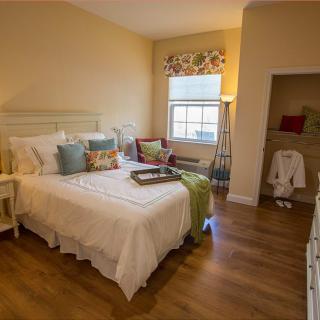 A cozy and bright bedroom with stylish decor.