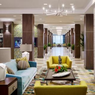 A modern hotel lobby with stylish furniture and elegant decor.