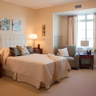 A cozy bedroom with a comfortable bed and elegant furnishings.