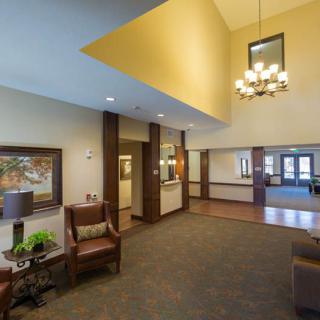 A modern lobby area with comfortable seating and elegant lighting.