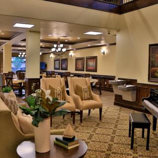 A cozy lobby with comfortable seating and elegant decor.