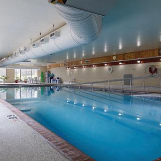 An inviting indoor swimming pool designed for relaxation and recreation.