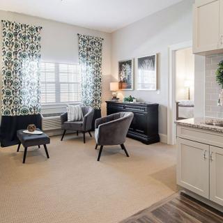 A modern living room with stylish furniture, natural lighting, and elegant decor.