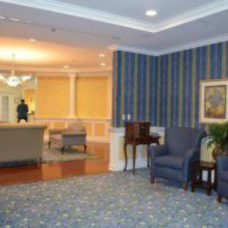 A cozy lobby area featuring comfortable seating and elegant decor.