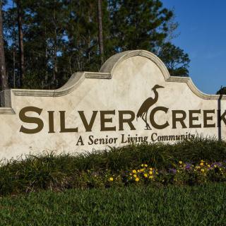Entrance sign for Silver Creek, a senior living community.