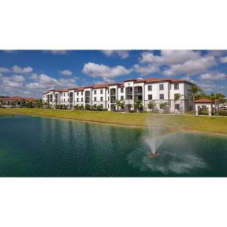 Modern apartment complex with a scenic lake and fountain.