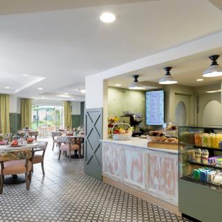 A modern caf interior with stylish furnishings and a cozy atmosphere.