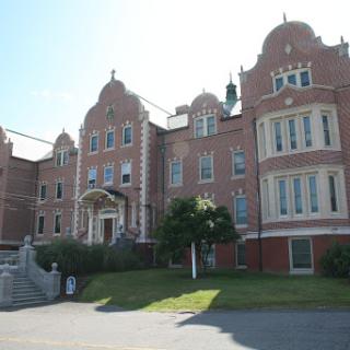 A historic brick building showcasing intricate architectural details.