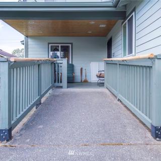 An accessible ramp leading to the entrance of a building.