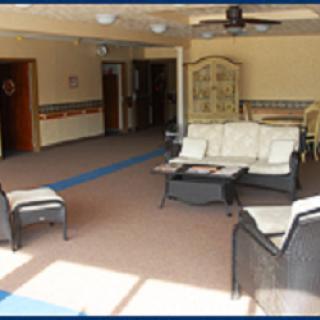 A spacious and inviting living room with comfortable seating, perfect for relaxation and social gatherings.