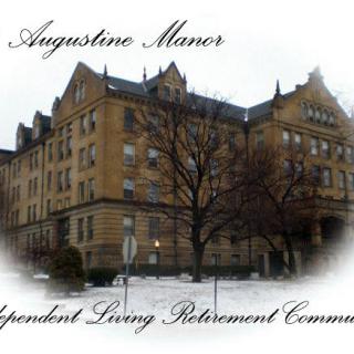 Augustine Manor Independent Living Retirement Community building in winter.