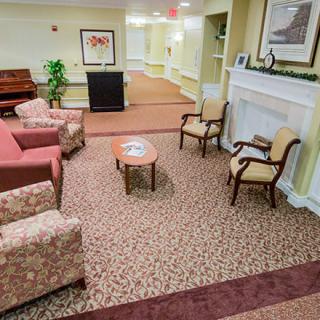A comfortable lobby area with seating and a piano.