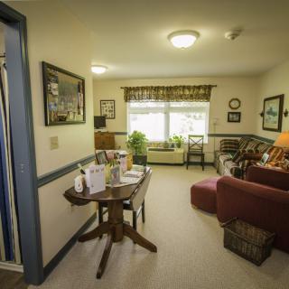 A cozy living room with comfortable seating and natural light.