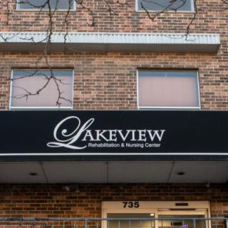 The exterior of Lakeview Rehabilitation & Nursing Center with its brick facade and signage.