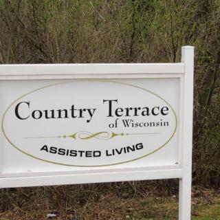 A sign for Country Terrace of Wisconsin Assisted Living.